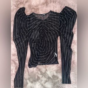 Beautiful see through blouse.